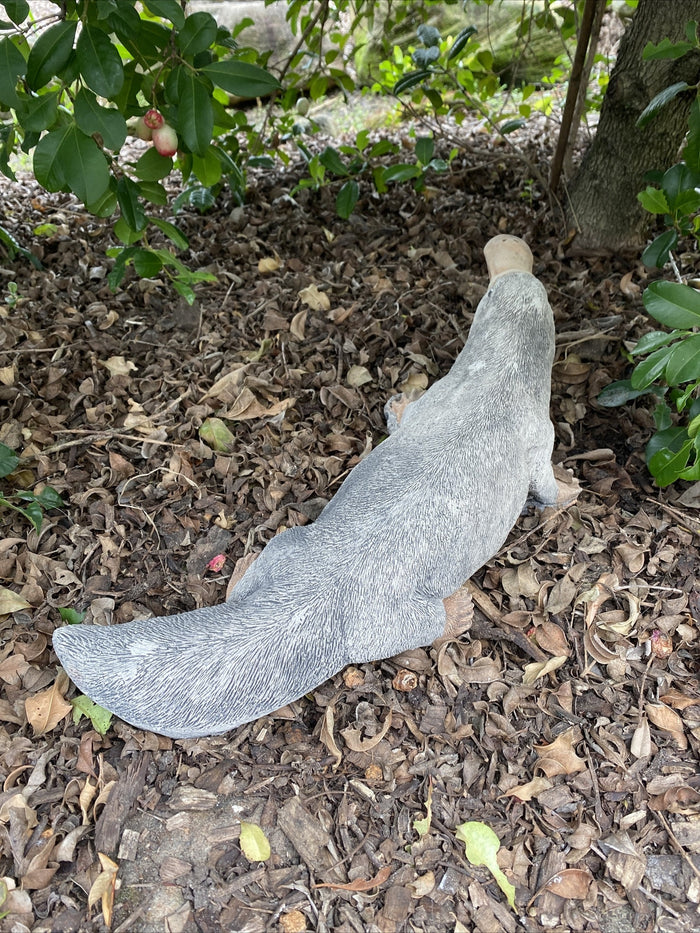 22nice4me Garden Statues hand-painted concrete platypus ornament nestled in garden mulch under a tree