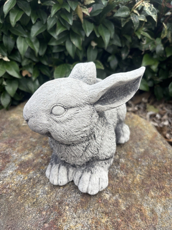 handcrafted grey concrete rabbit garden ornament with realistic textured fur detail