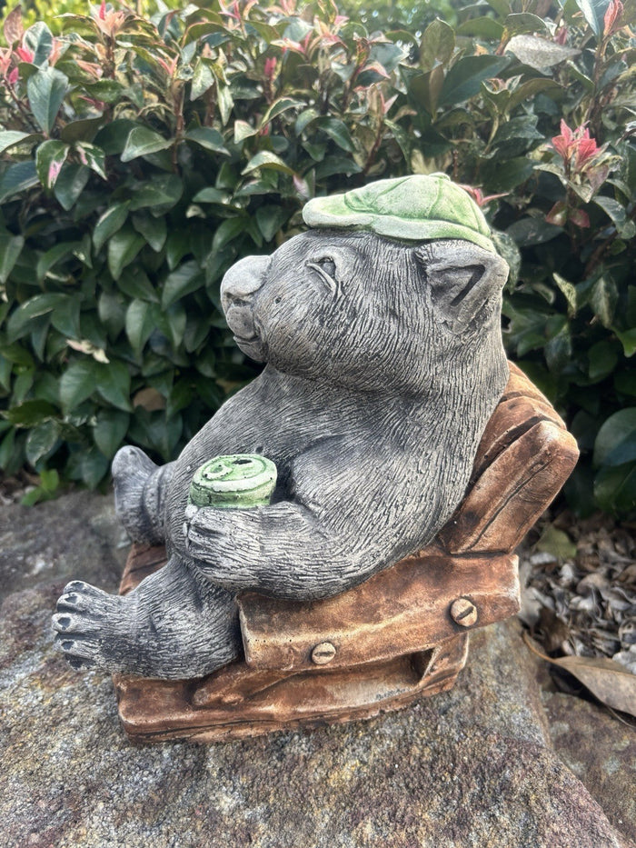 22nice4me Garden Statues concrete wombat statue wearing a green cap and holding a beer while relaxing in a chair