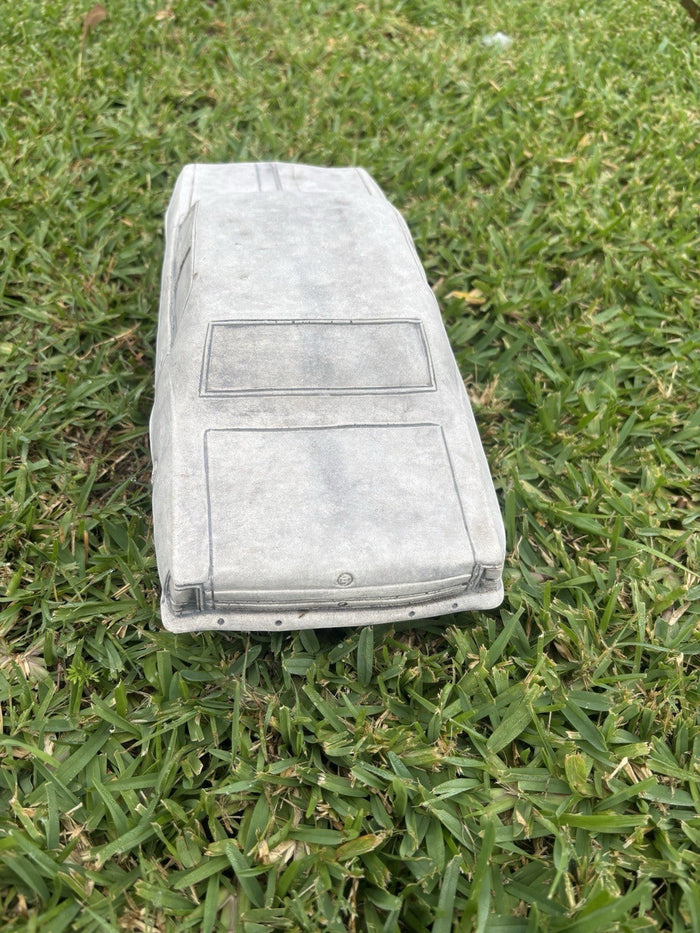 22nice4me Garden Statues HK Brougham concrete car ornament in grey, viewed from the rear on green grass.