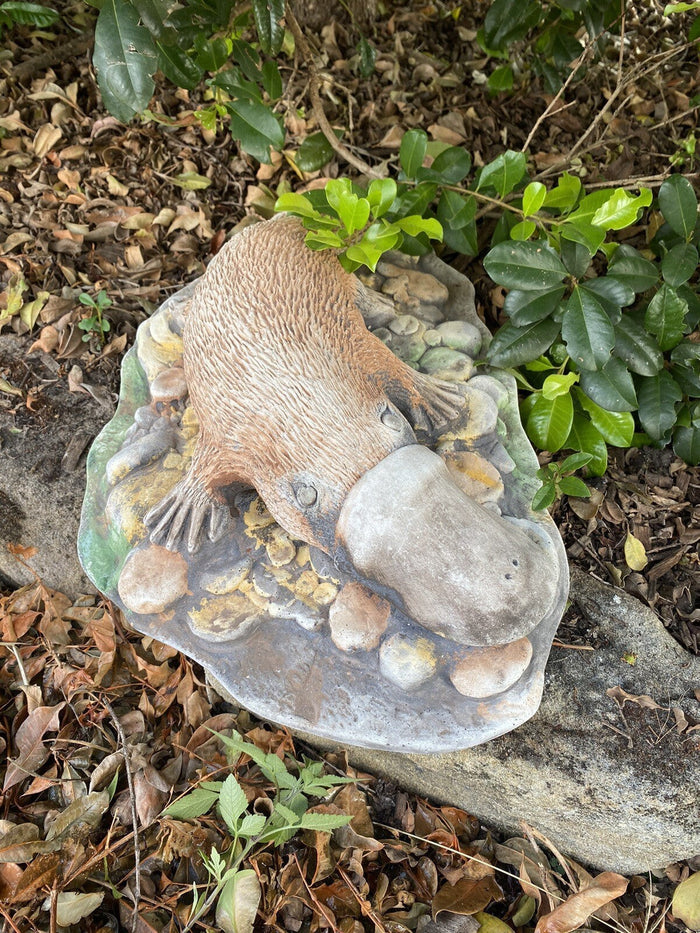 22nice4me Garden Statues hand-painted concrete platypus sculpture resting on a rocky base for outdoor garden decor