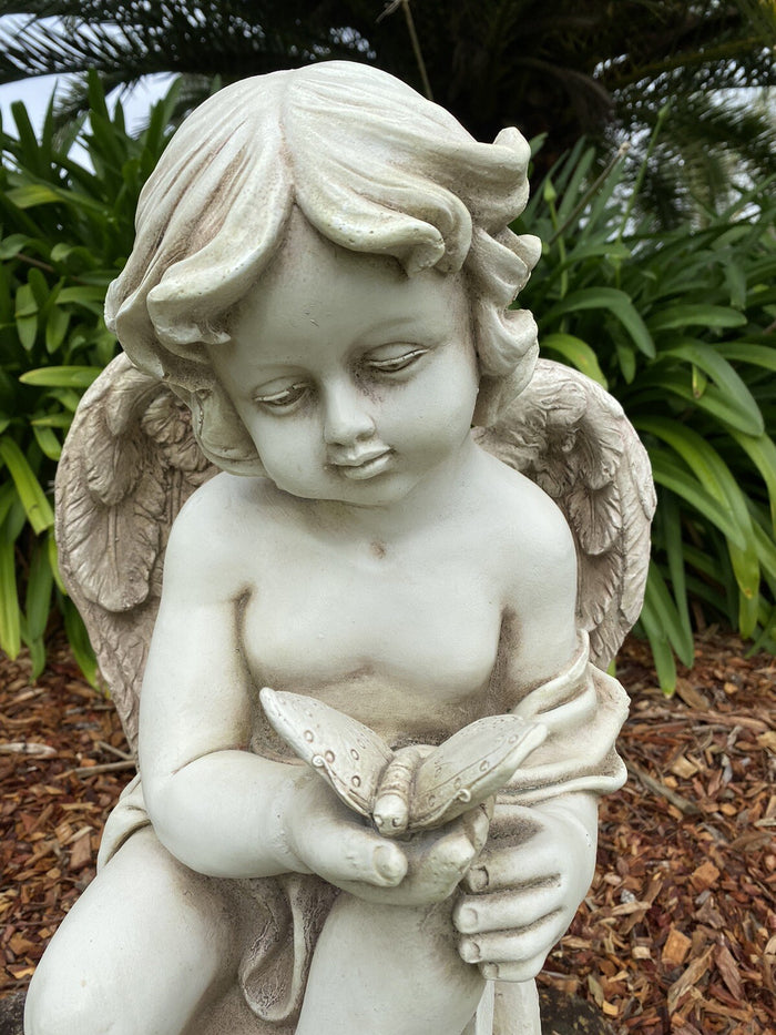 CHERUB ANGEL PLAYING WITH A BUTTERFLY GARDEN ORNAMENT STATUE FIGURINE SCULPTURE
