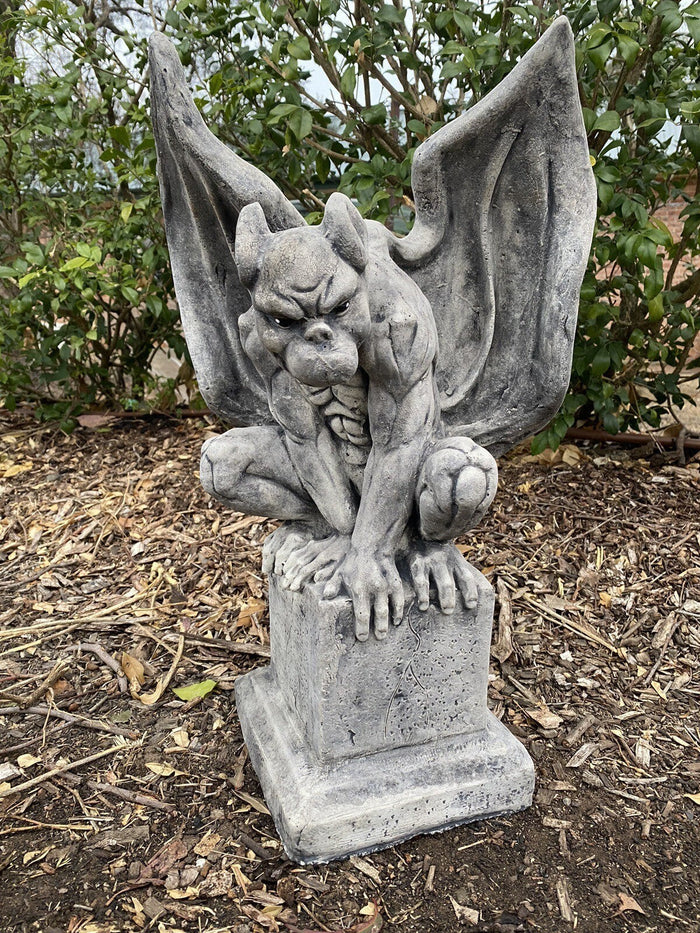 22nice4me Garden Statues concrete gargoyle figurine on a pedestal with an antique rustic finish in a garden setting