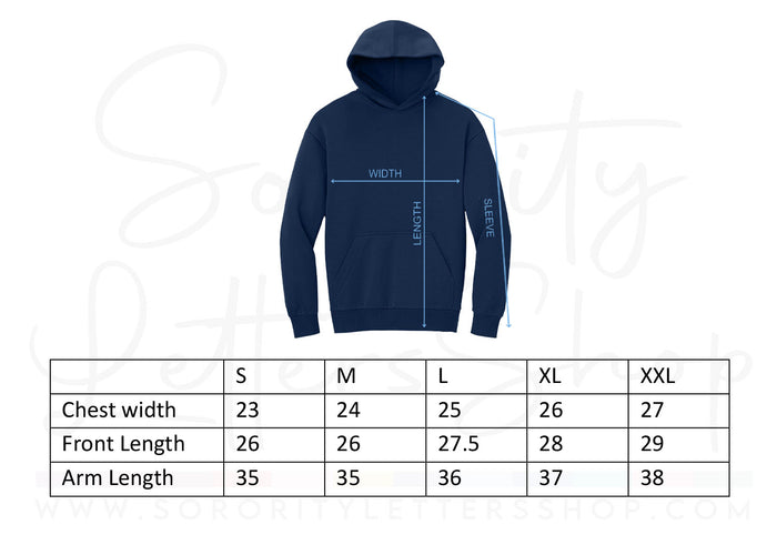 Details of the hood and drawstrings on an oversized navy hoodie with a collegiate look.
