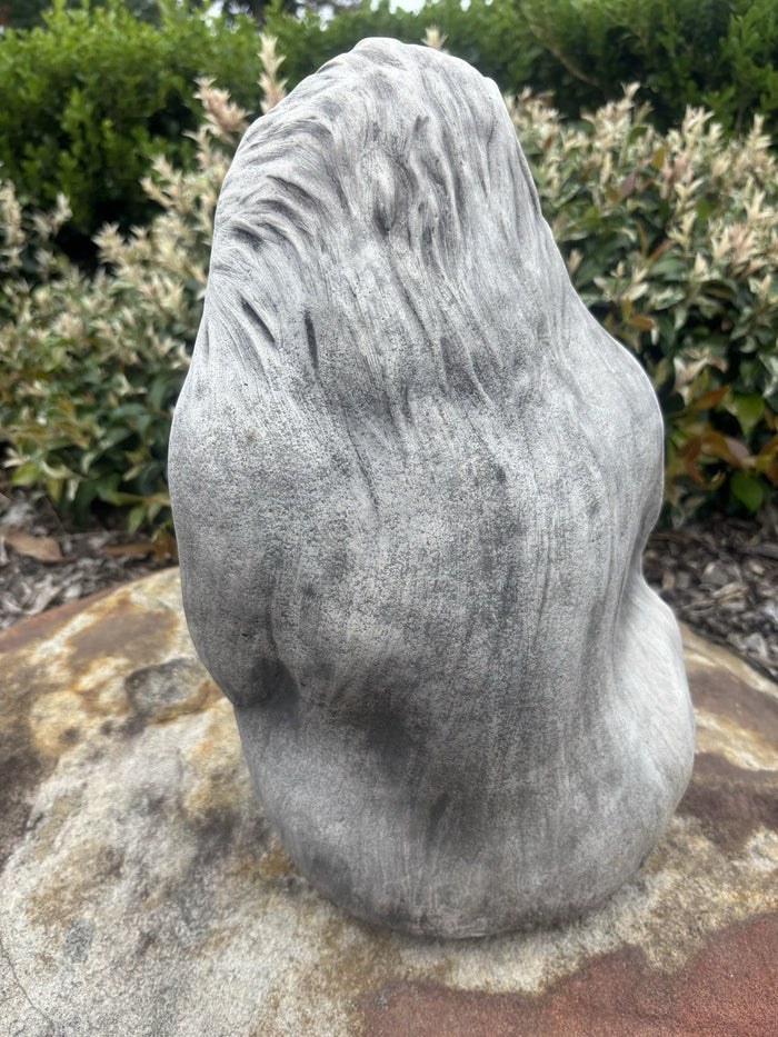 22nice4me Garden Statues female gorilla concrete garden ornament with a hand-painted grey matt finish, back view.