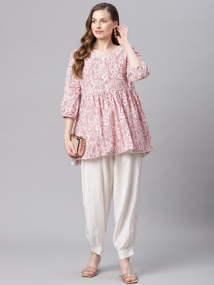 Versatile short kurti styled for casual and semi-formal outings, paired easily with leggings or jeans.