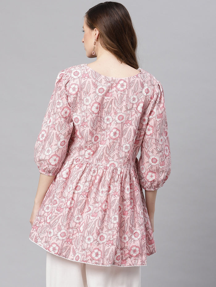Versatile short kurti styled for casual and semi-formal outings, paired easily with leggings or jeans.