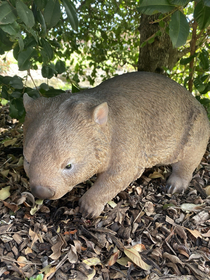 22nice4me Garden Statues hand-painted resin wombat figurine standing in a garden setting under a tree