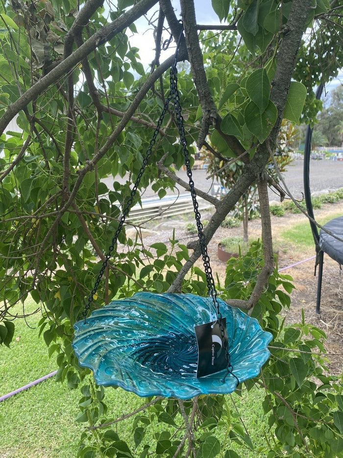 22nice4me Garden Statues hanging glass bird feeder in teal with a black chain suspended from a tree branch