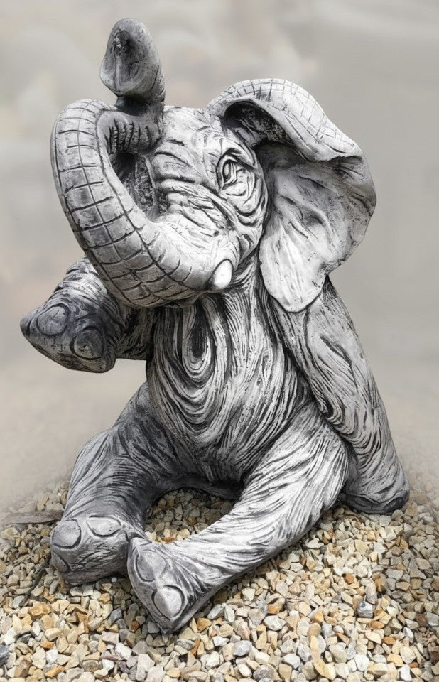 22nice4me Garden Statues large grey concrete elephant ornament with trunk raised for good luck in a garden setting