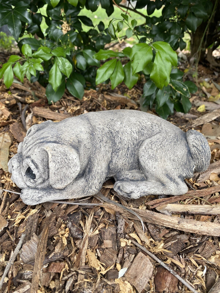 Side view concrete laying Pug garden statue solid cement outdoor ornament