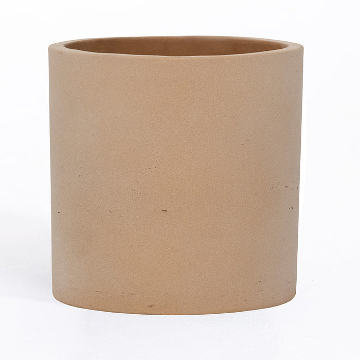 Beige ceramic planter on a white background