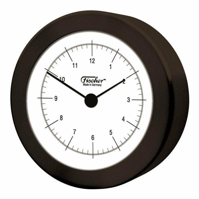 Round wall clock with black frame and white dial, German made, displaying time.
