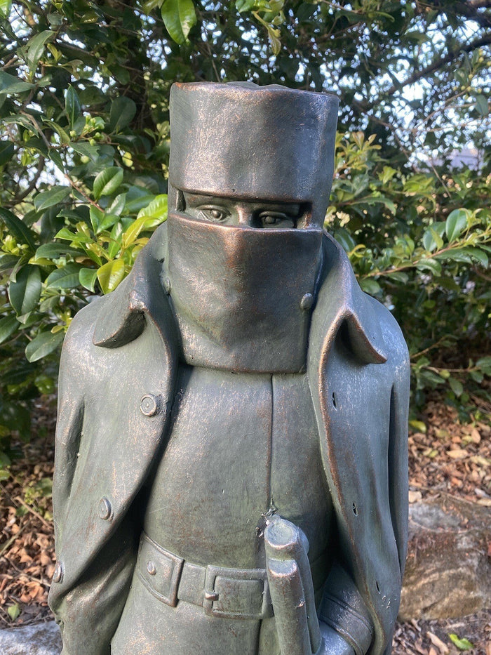 22nice4me Garden Statues Ned Kelly fiber clay figurine with a rustic hand-painted finish in a garden setting