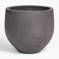 Dark gray fiberclay pot on a white background.