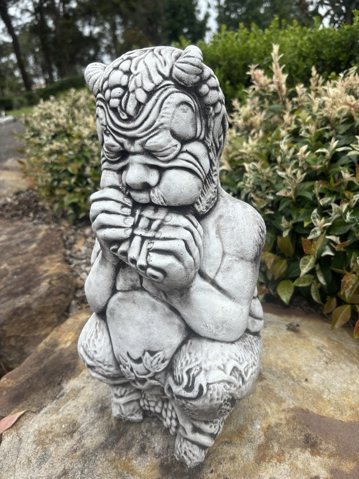 22nice4me Garden Statues concrete Pan statue with antique finish, depicting the Greek god playing pan pipes outdoors.
