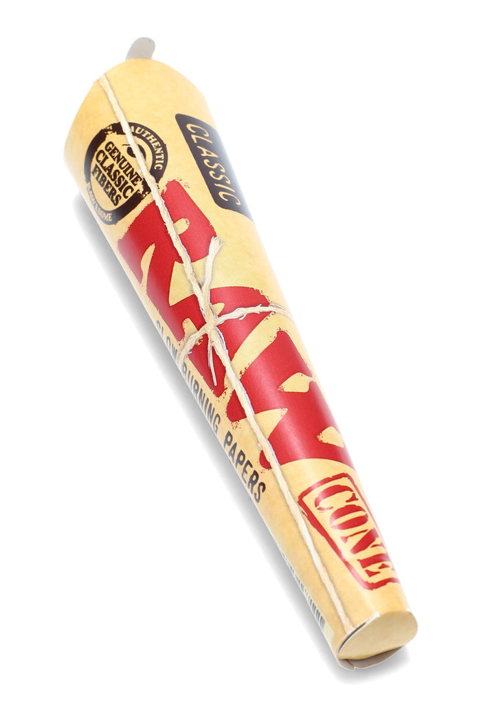 RAW 1¼ Classic six-pack of pre-rolled cones on white background, unbleached paper with integrated tip and hemp gum.