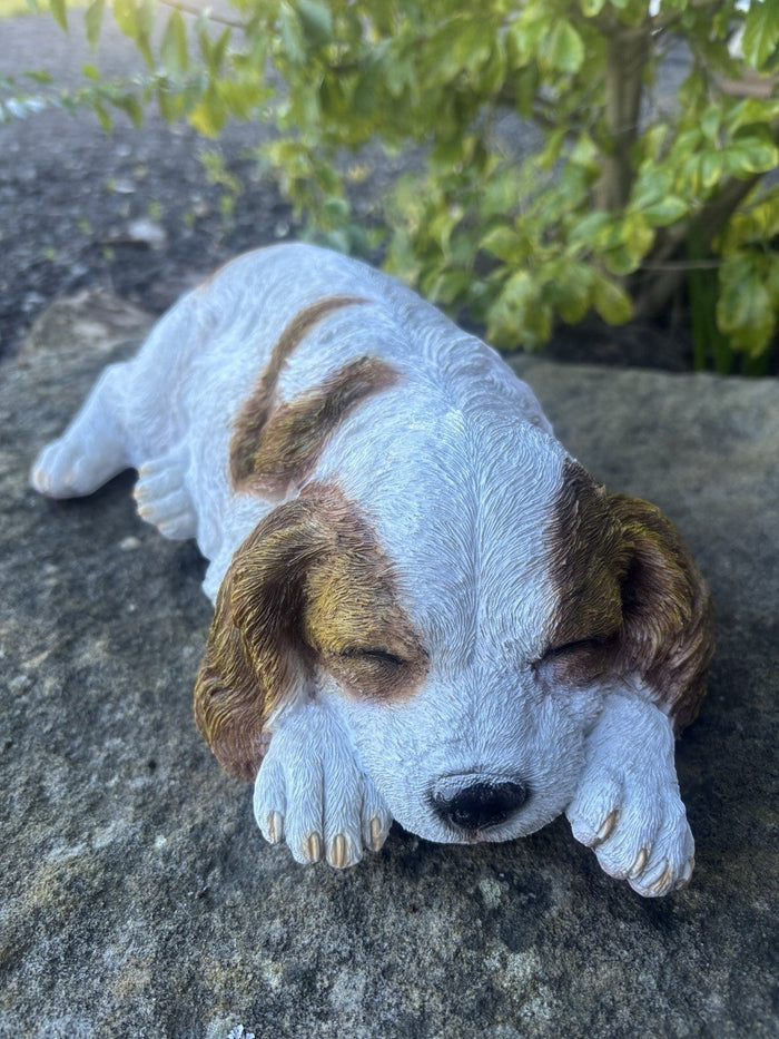 resin laying Cavalier King Charles Spaniel ornament with realistic hand-painted details.