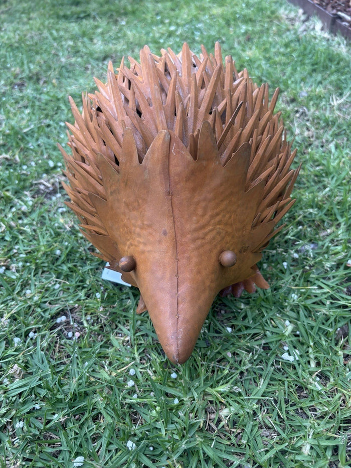 22nice4me Garden Statues Australian echidna metal sculpture with a rustic brown finish on green grass