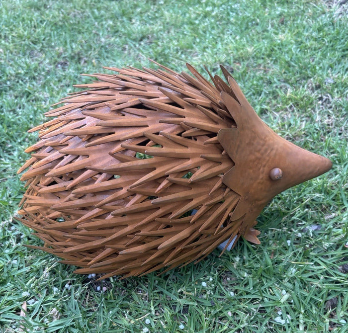 22nice4me Garden Statues Australian echidna metal sculpture with a brown rustic finish on green grass