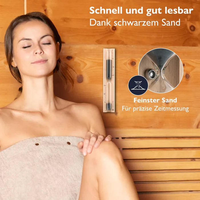 Woman relaxing in sauna with a precise sauna sand timer featuring black sand on wall
