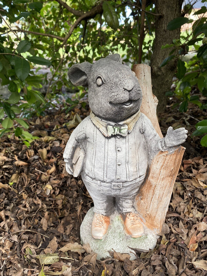 22nice4me Garden Statues Willow Father Rabbit concrete statue wearing a cardigan and pants in a garden setting