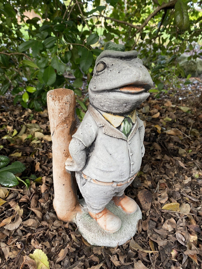 22nice4me Garden Statues Willow frog Mr Fisher concrete garden ornament wearing a suit and hat in a garden setting