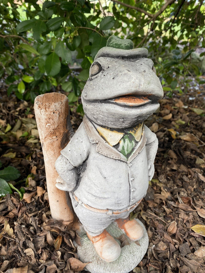 22nice4me Garden Statues Willow frog Mr Fisher concrete garden ornament with hand-painted details in a garden setting