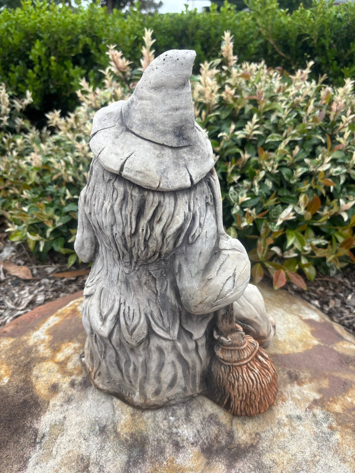 22nice4me Garden Statues witch with broomstick concrete garden ornament, hand-painted, rear view in garden setting